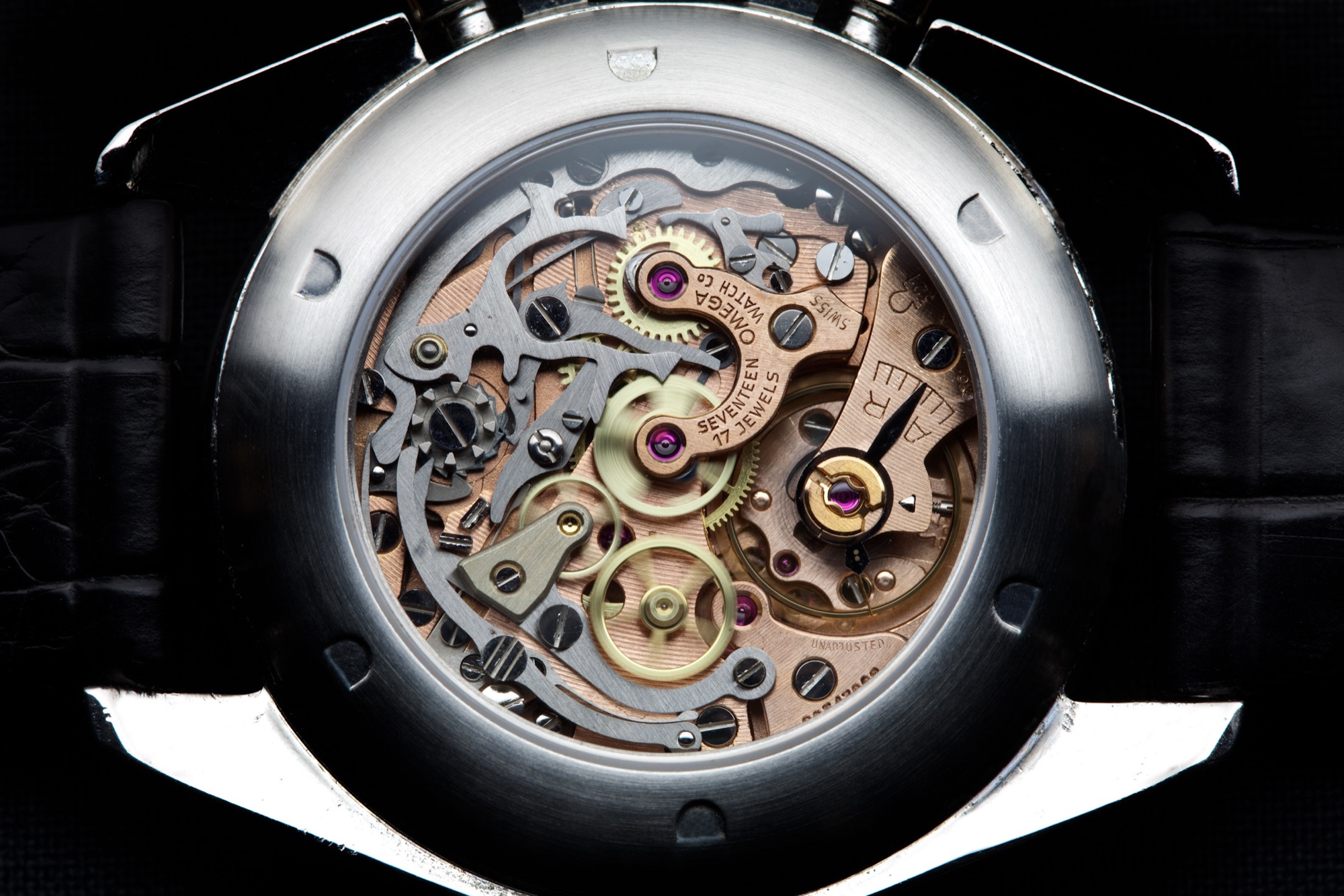 Omega calibre 321 chronograph movement seen through a display caseback